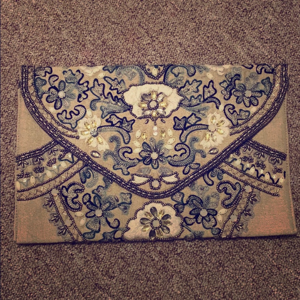 Nude bejeweled clutch